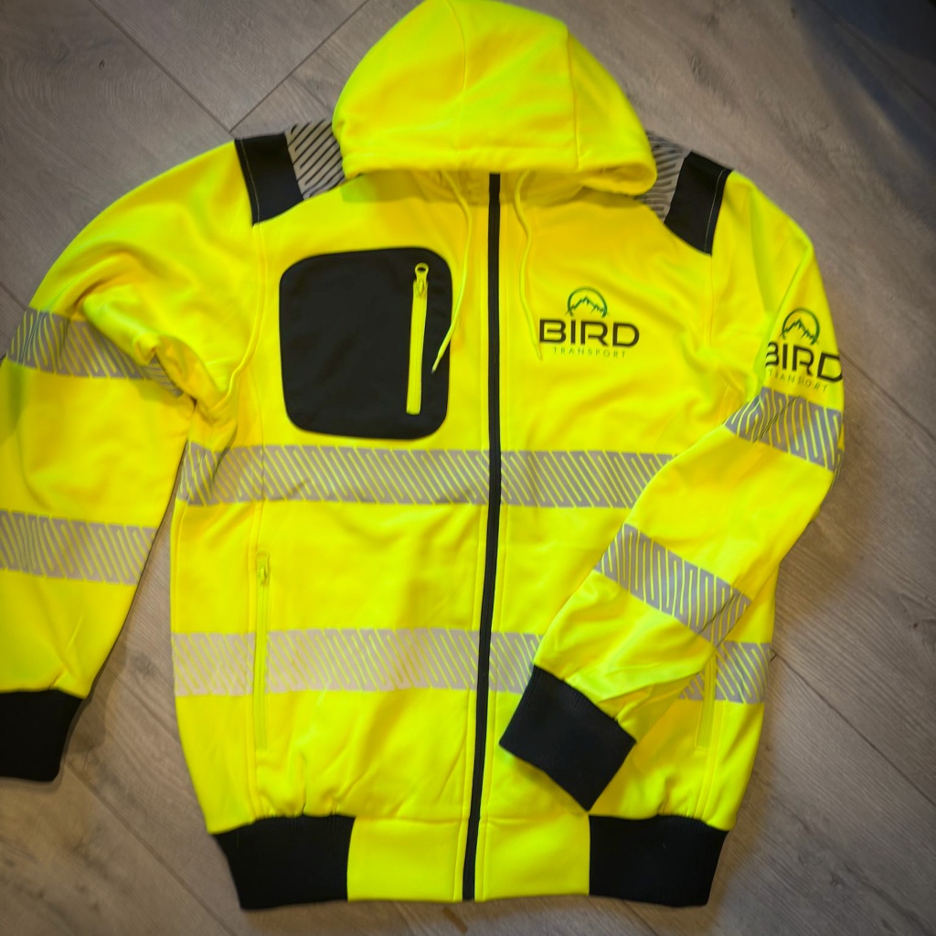 Safety jacket with logo Manchester prepared for Bird Transport by Logo Printing