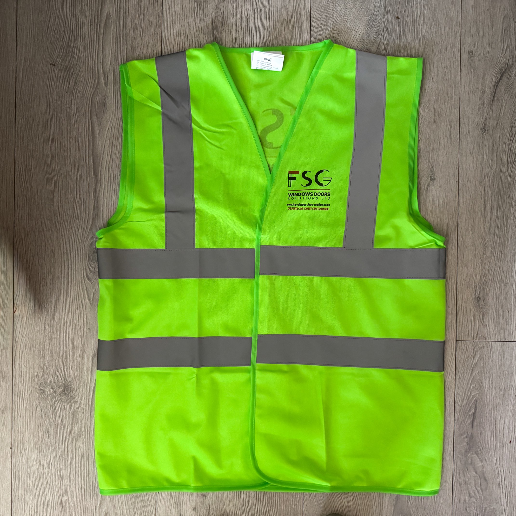 Branded hi-vis vest with FSG logo and company details – Wembley