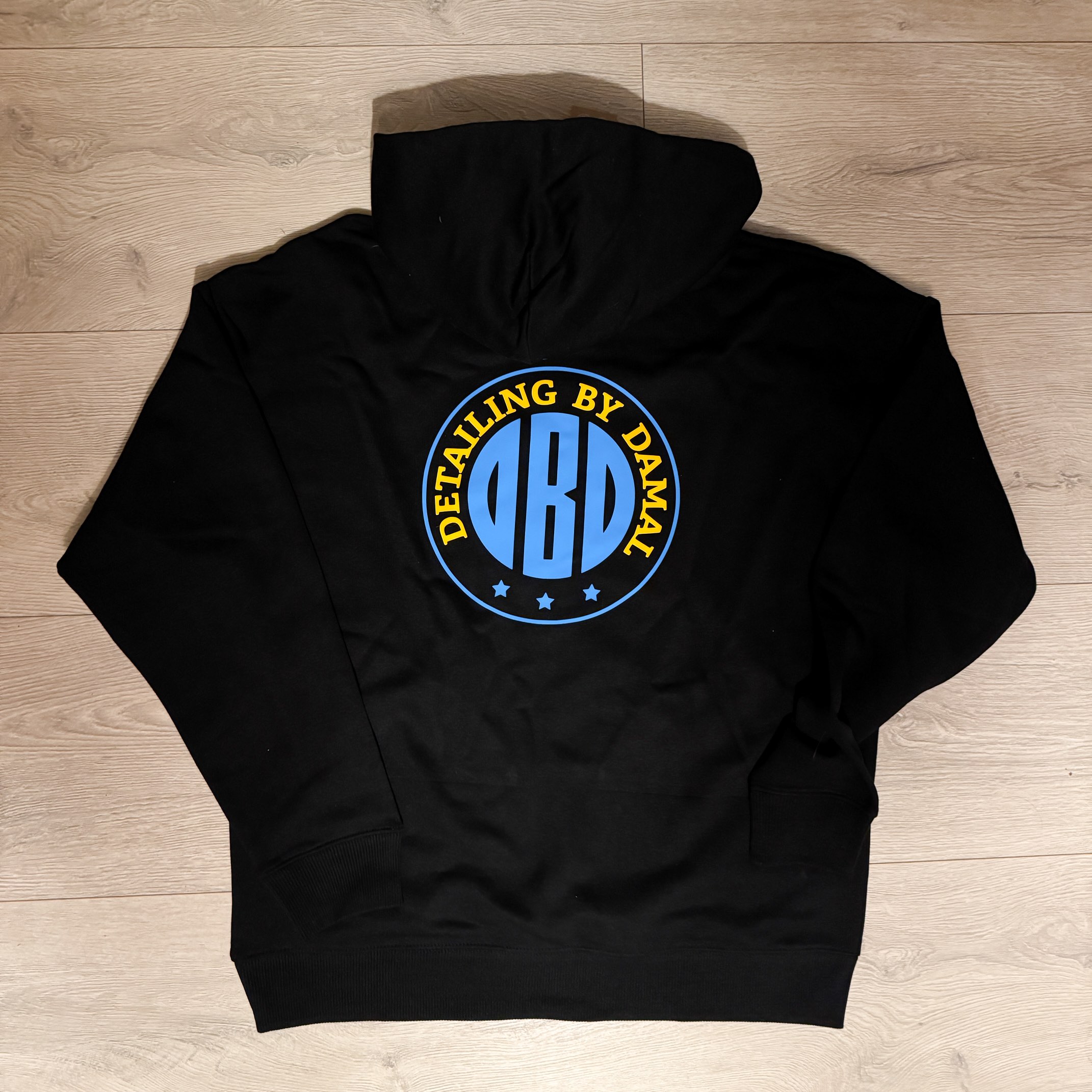Custom printed hoodie with a car detailing company logo in Bristol – Logo Printing