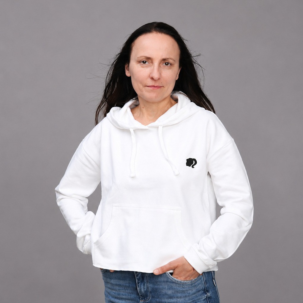 White pullover hoodie with a small black chest print, custom printed for Dotee.art by Logo Printing